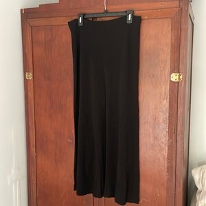Long black skirt by Andrea Jovine. Size M